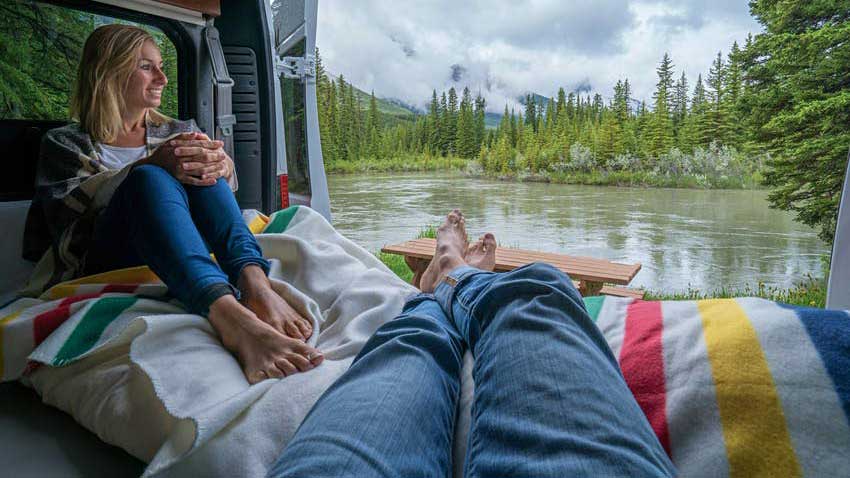Couple Relaxing While Camping