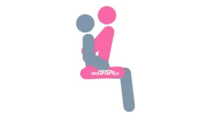 This stick figure image depicts a man and woman having sex in the Mastery sex position. The man is sitting on the recliner or sofa. The woman is straddling his lap while facing him with her knees near his butt.